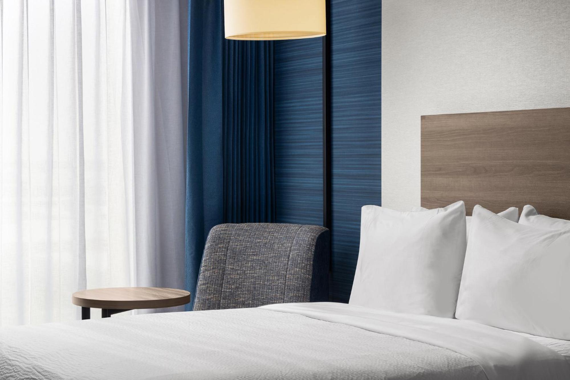 Standard Queen Room with Two Queen Beds and Walk-In Shower